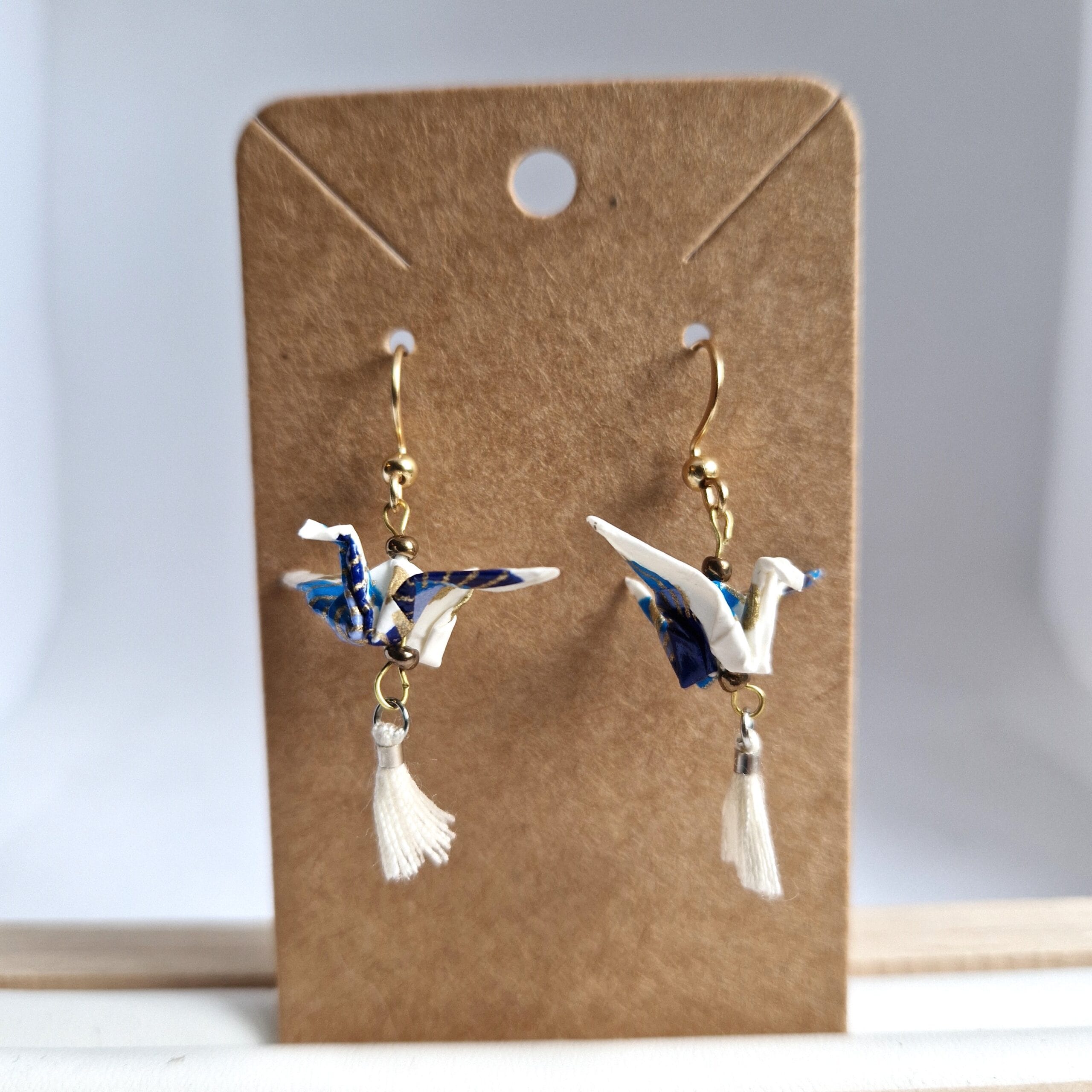boucles d'oreilles grues pompon